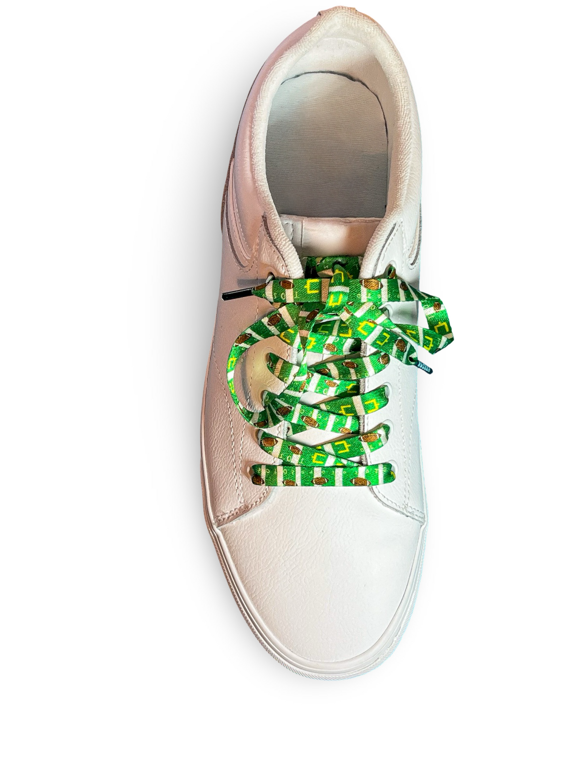 White sneaker with colorful football themed shoelaces on a white background
