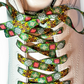 Colorful floral-patterned shoelaces on a white sneaker
