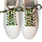 White sneakers with colorful, patterned laces on a white background