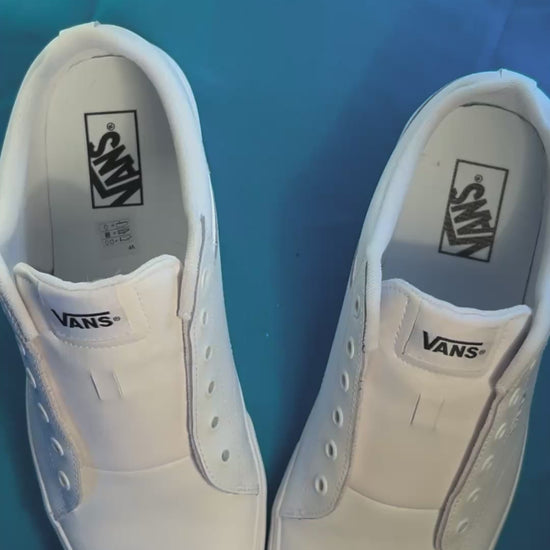 rose shoelaces being laced up on a fresh pair of white sneakers