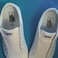 rose shoelaces being laced up on a fresh pair of white sneakers