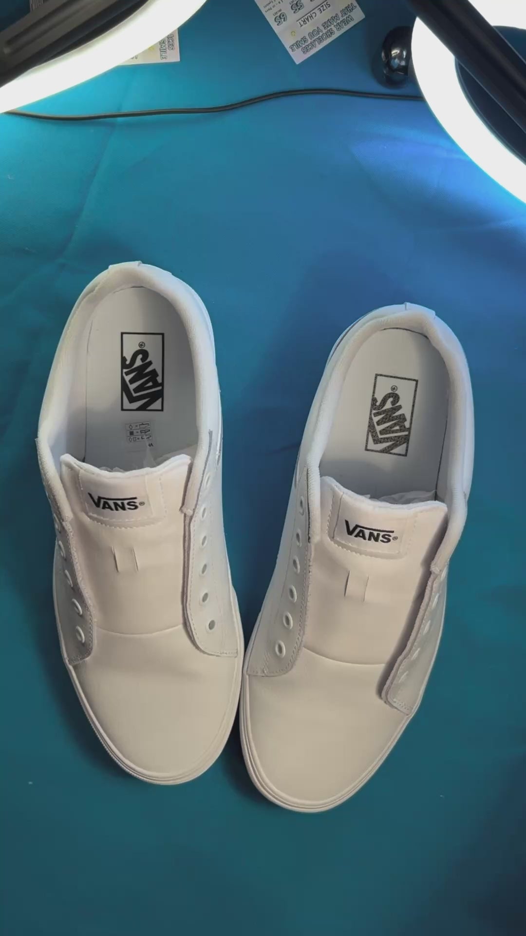 Diamond patterned shoelaces getting laced up on a fresh pair of white sneakers