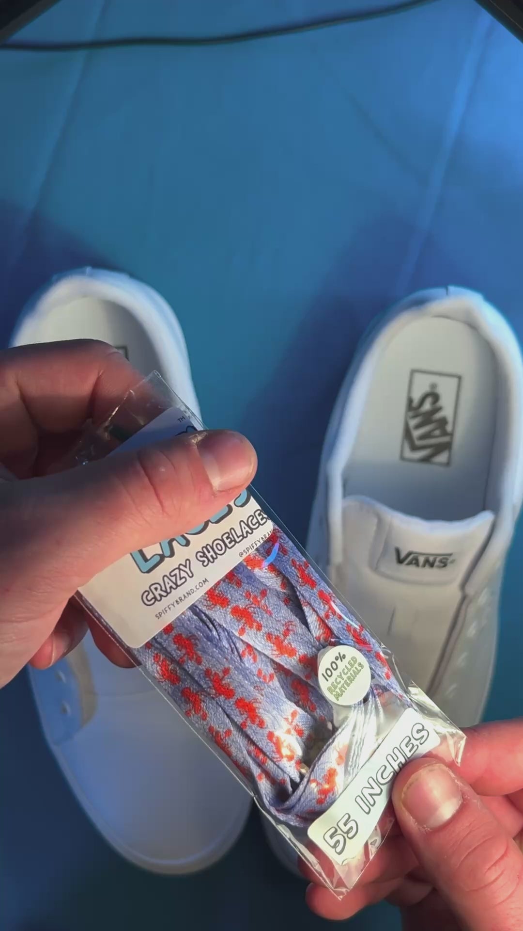 Colorful and fun lobster shoelaces being laced up on a fresh pair of white sneakers