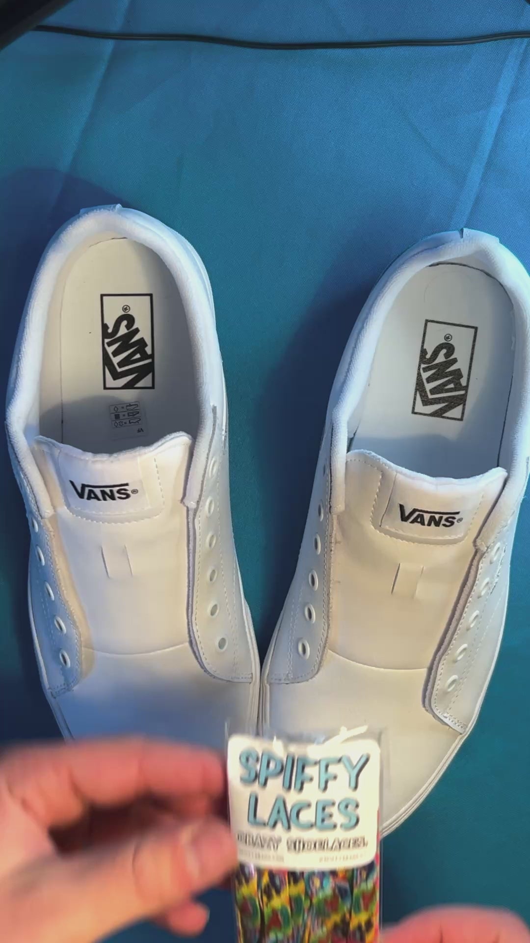 Wizard themed shoelaces being laced up on a fresh pair of white sneakers